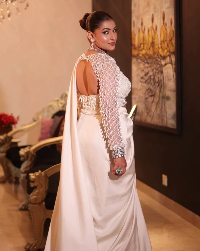 white indo western satin drape outfit with embellished blouse and drape skirt